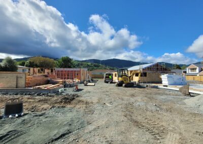 View of three blocks at Stoke Stage 2 development_Habitat Nelson_November 2023. One block with walls and roof standing, the other two starting to come up.